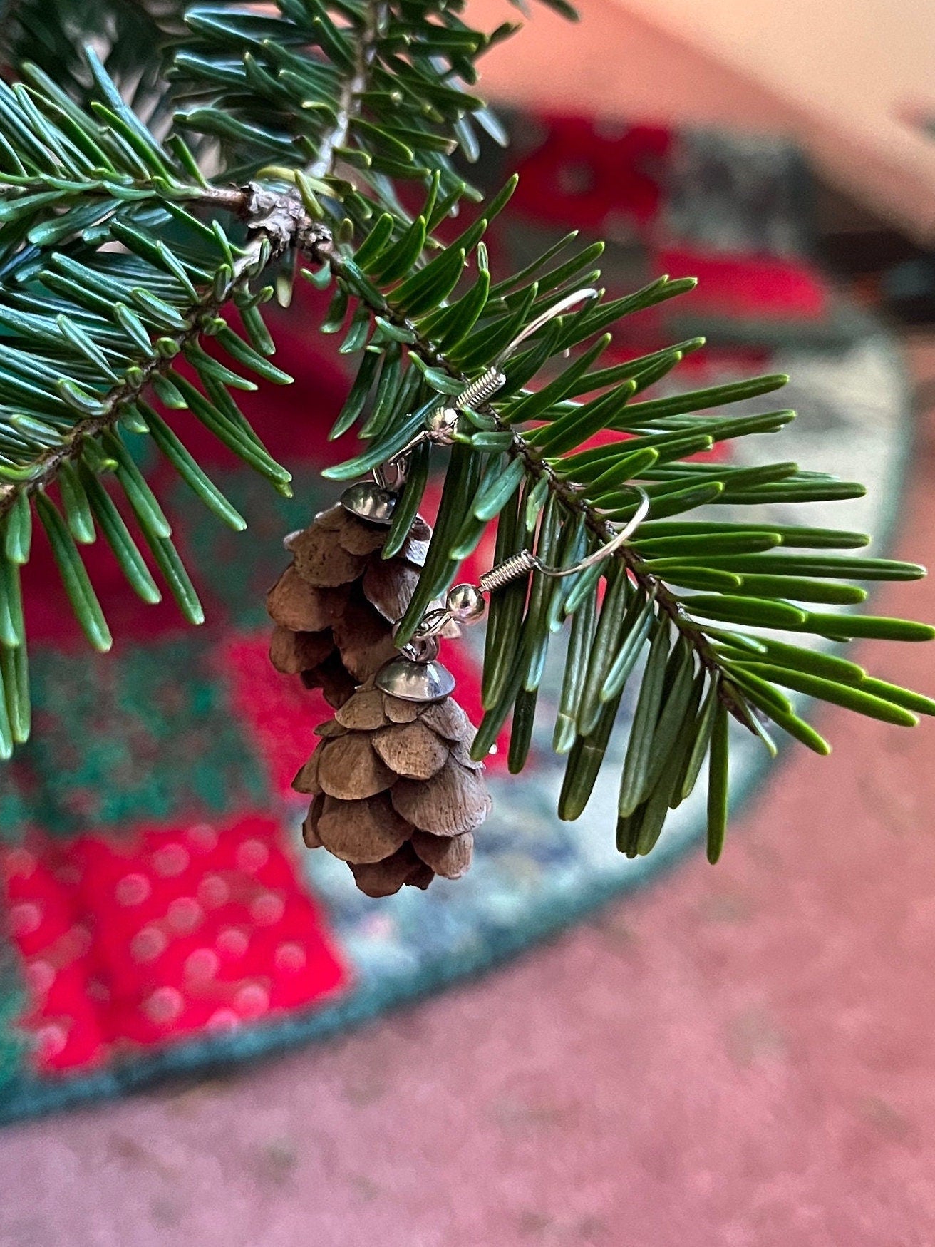 mini pine cone earrings on christmas tree