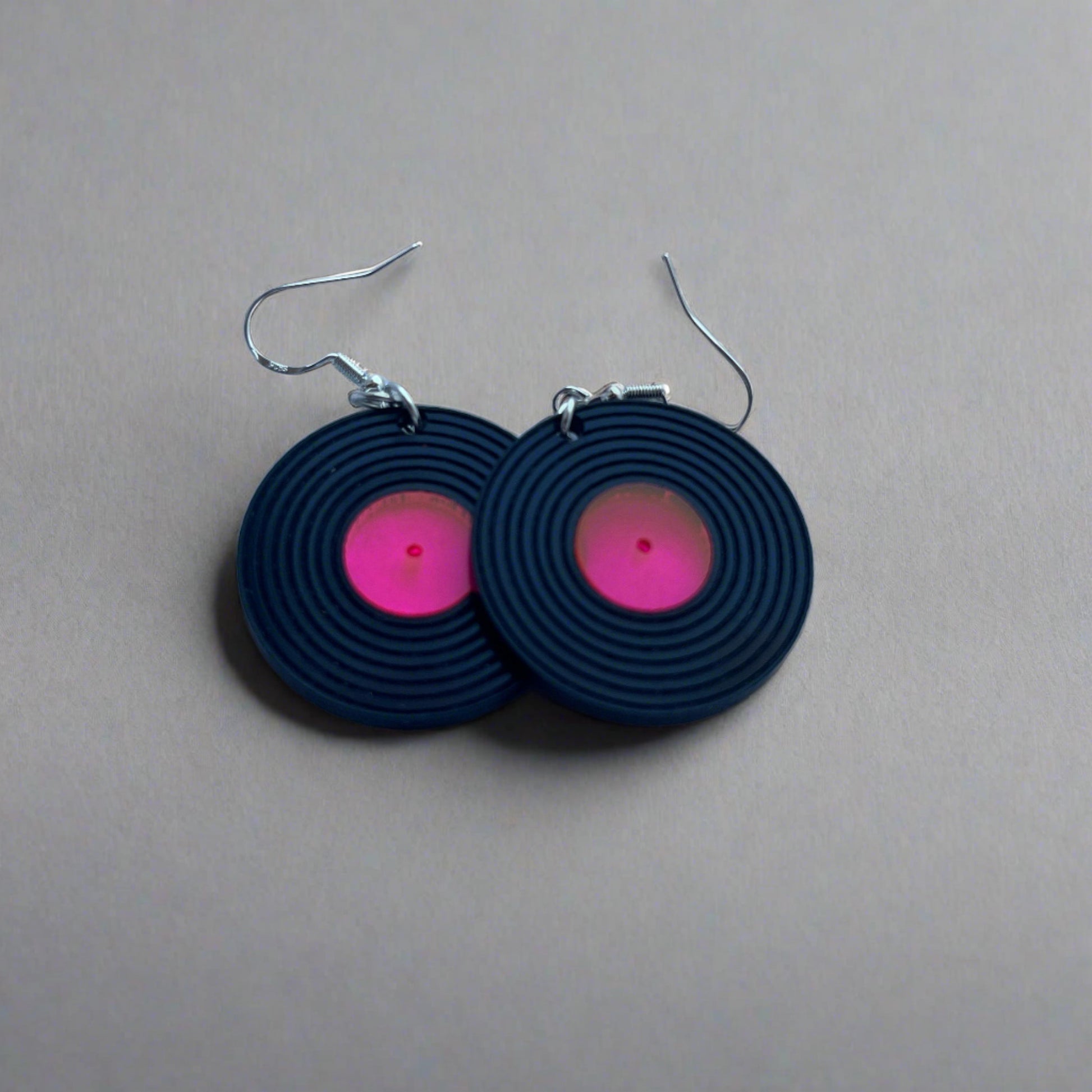 vinyl record earrings with pink center